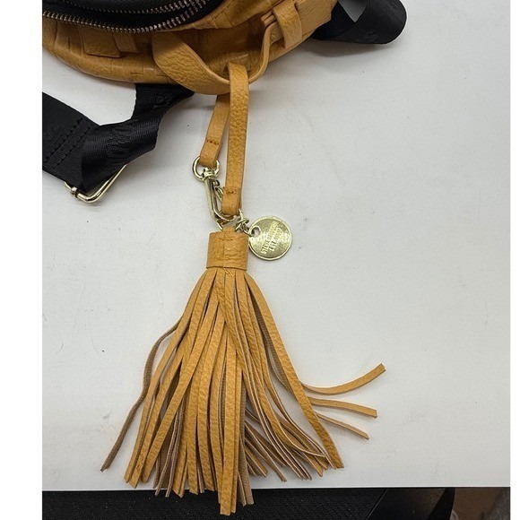 Steve Madden Yellow Embossed Logo Mini Backpack Mustard Tassel -corner peeling - Picture 9 of 11